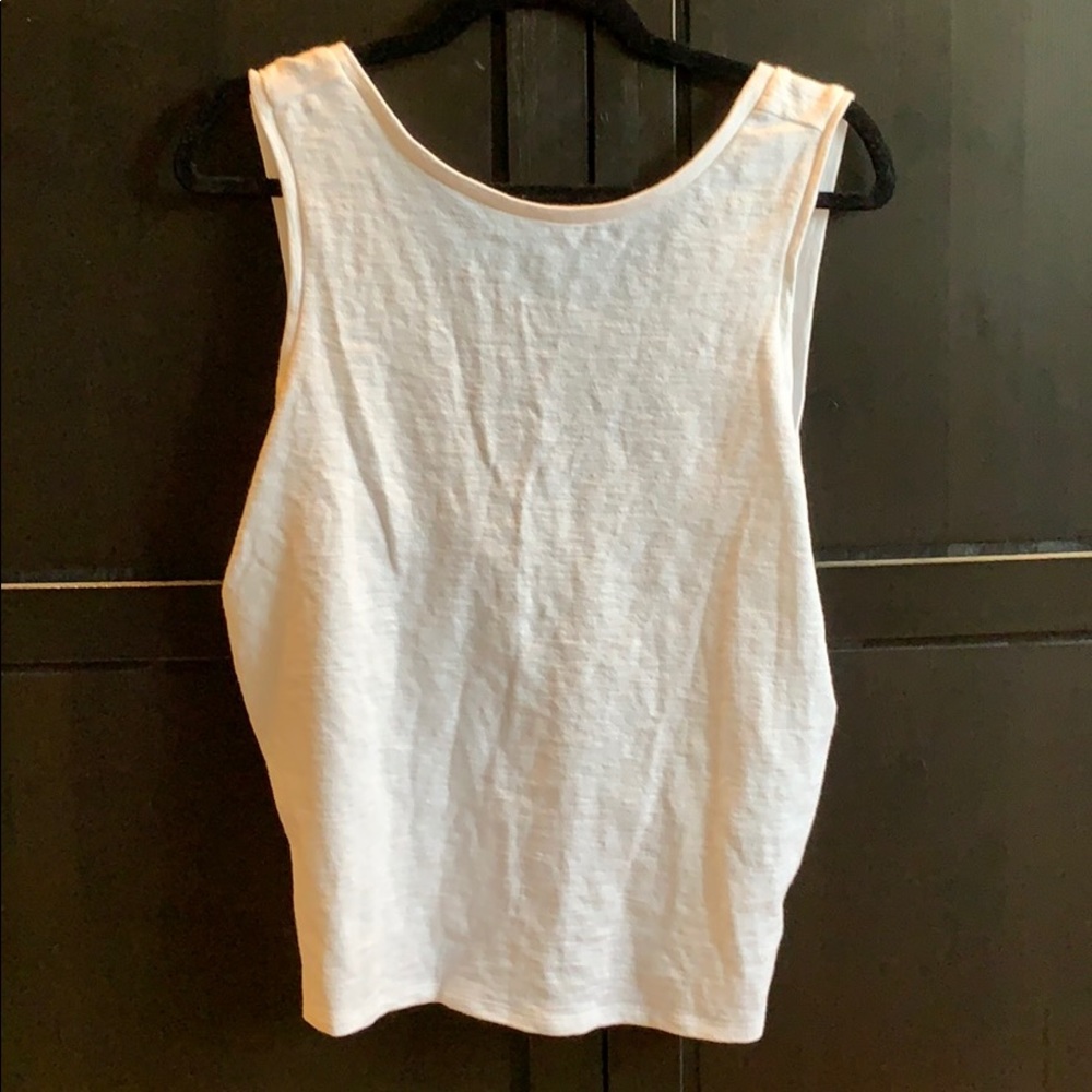 White tank top with twist back.